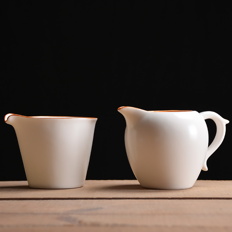 White porcelain) suit loading points tea exchanger with the ceramics fair keller of tea and a cup of tea sea filtering kung fu tea tea accessories