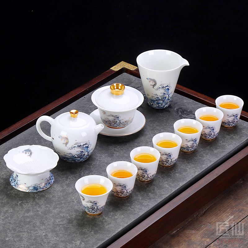 Artisan fairy dehua white porcelain tea set household suet jade kung fu tea gift box and contracted tea tureen teapot