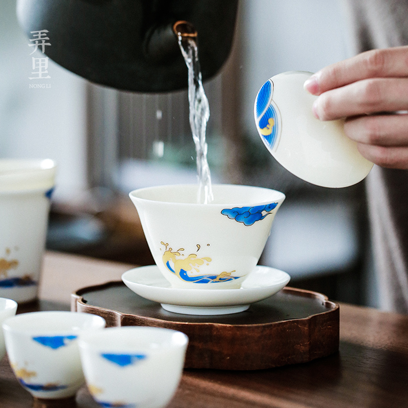 Make waves in the white porcelain tea set household contracted kung fu tea pot of a complete set of ceramic tea tureen jade porcelain cups
