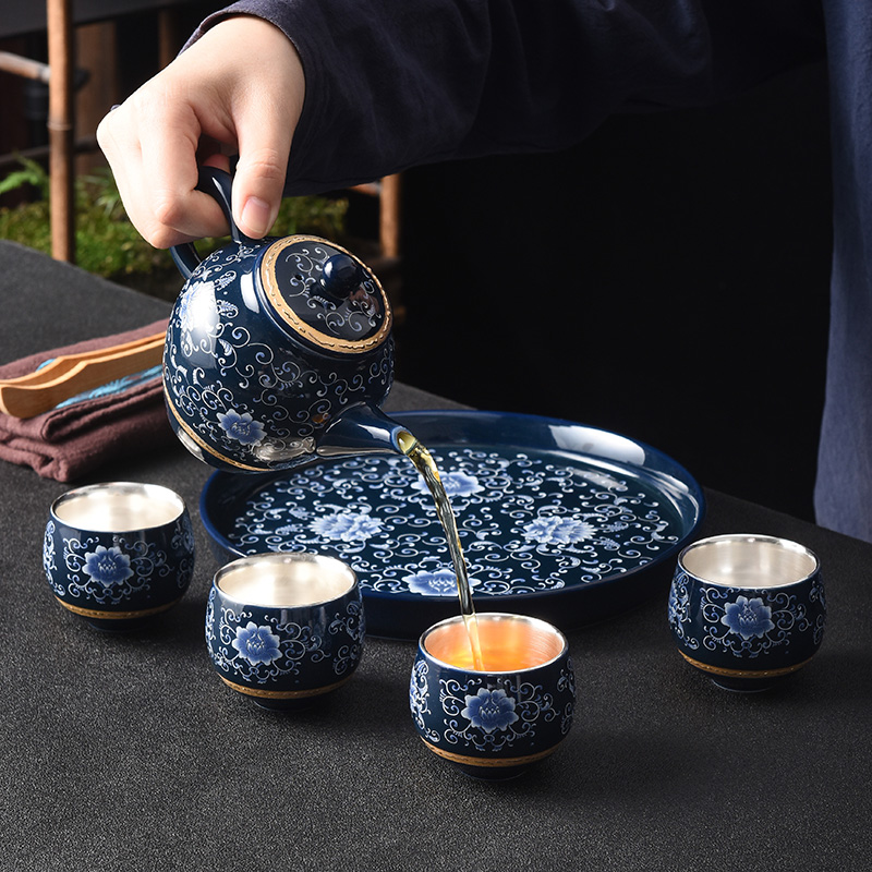 Jingdezhen household kung fu tea tea set tea service office to receive a visitor a small set of pot of four cups coppering. As silver tea set