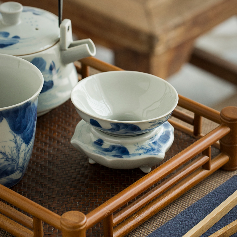 Jingdezhen hand - made) ceramic filter filter kung fu tea set of blue and white porcelain tea tea with parts across indicates the tea