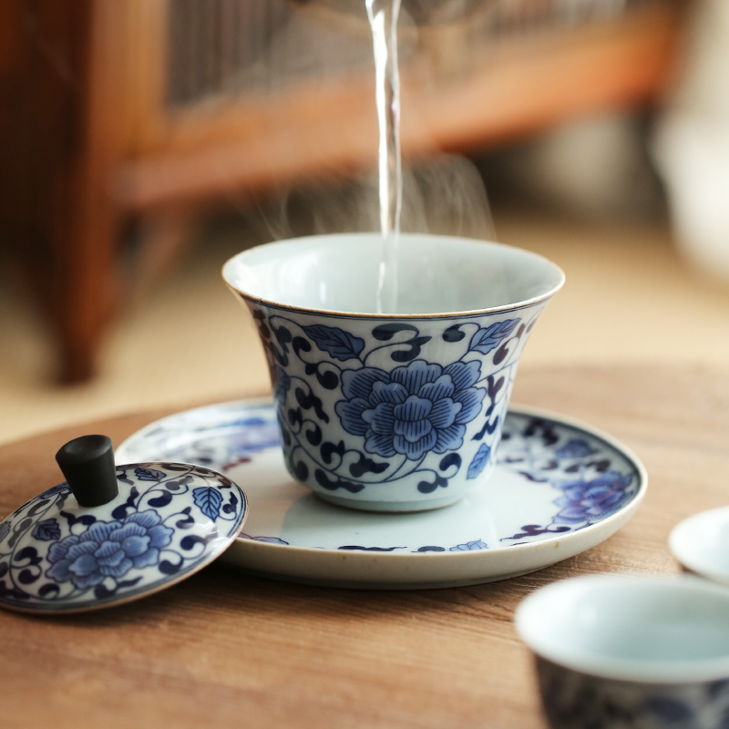 Jingdezhen hand - made porcelain tea set suit household small sets of kung fu tea cup tureen tea pot dry terms plate