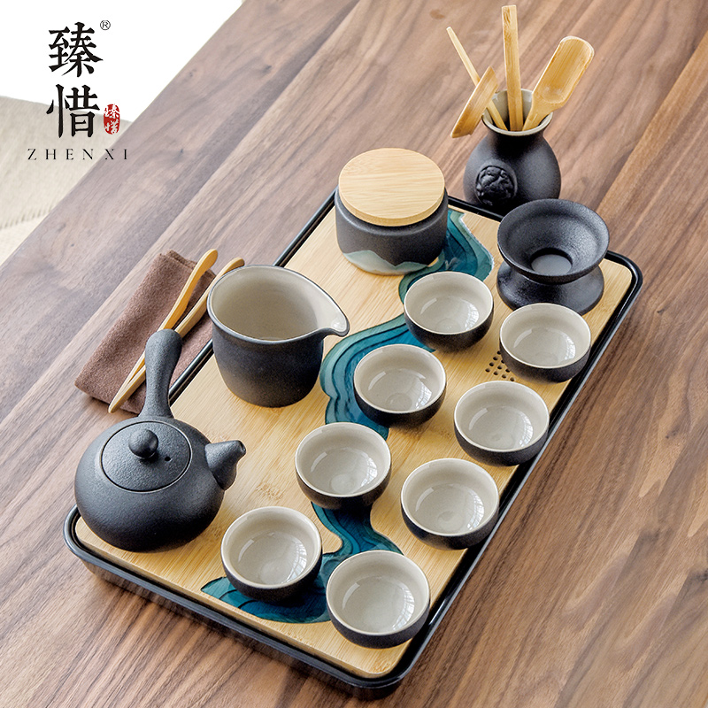 By understanding the modern black ceramic kung fu tea set household contracted mini Japanese tea tea tray of a complete set of the teapot