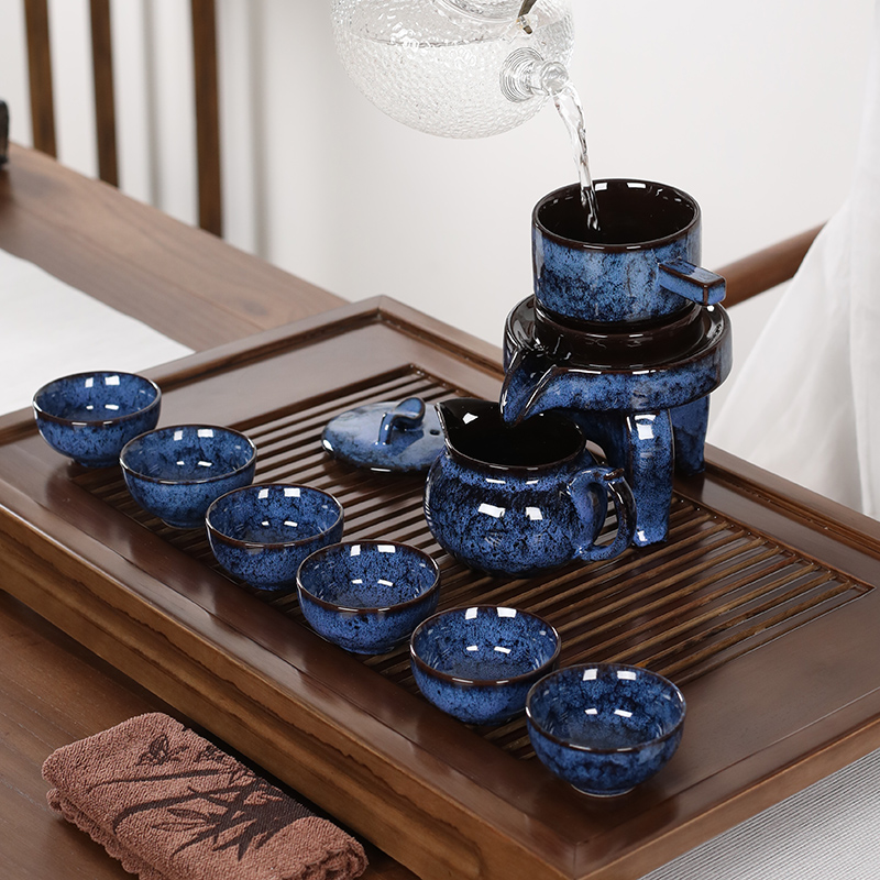 NiuRen porcelain masterpieces kung fu tea set home built lamp automatic variable lazy stone mill make tea, tea tray was suit