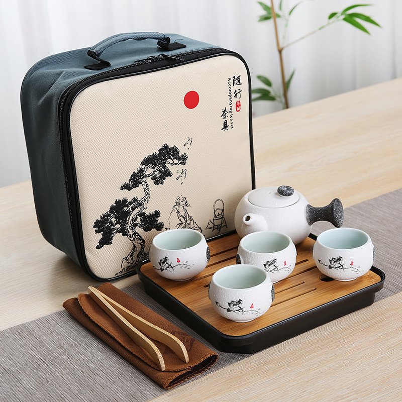 Ceramic is suing travel kung fu tea set suit portable bag contracted with snow a pot of four cups of custom wholesale