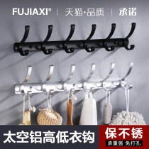 The clothes in the black fitting room are hooked to the Nordic wall wall hood hook wardrobe hook wardrobe hook hook hook hook hook hook hanger