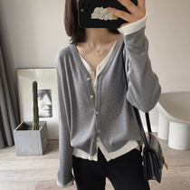 V-neck fine wool knitted cardigan top womens 2022 early autumn French fake two-piece single-breasted long-sleeved sweater coat