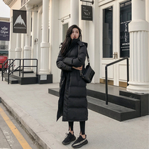 Anti-season black long style down clothes woman 2021 new overknee thickened Korean version white duck suede Lean Winter Northeast Tide