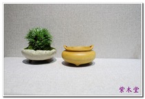 A small leaf yellow poplar wood incense stove