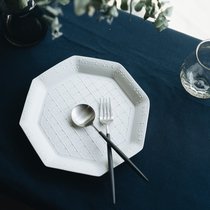 Japanese Ceramist writer Shi Shenmeis hand for an anise dish dinner plate