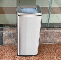 Stainless steel trash bin smoking ash straight into the overhead hall government unit corridor elevator aisle commercial