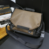 2022 new single shoulder bag male minimalist casual skew satchel Han version street head fashion postman bag tide retro locomotive bag