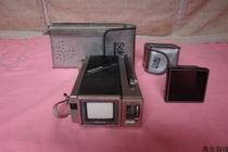 New Net and Old - fashioned objects with early Japanese miniature portable 1 - inch Panasonic black and white TV sets