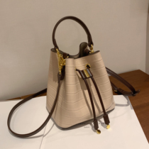 South wind cherry meatballs cooperation drawstring bucket bag women 2021 new fashion portable shoulder messenger bag