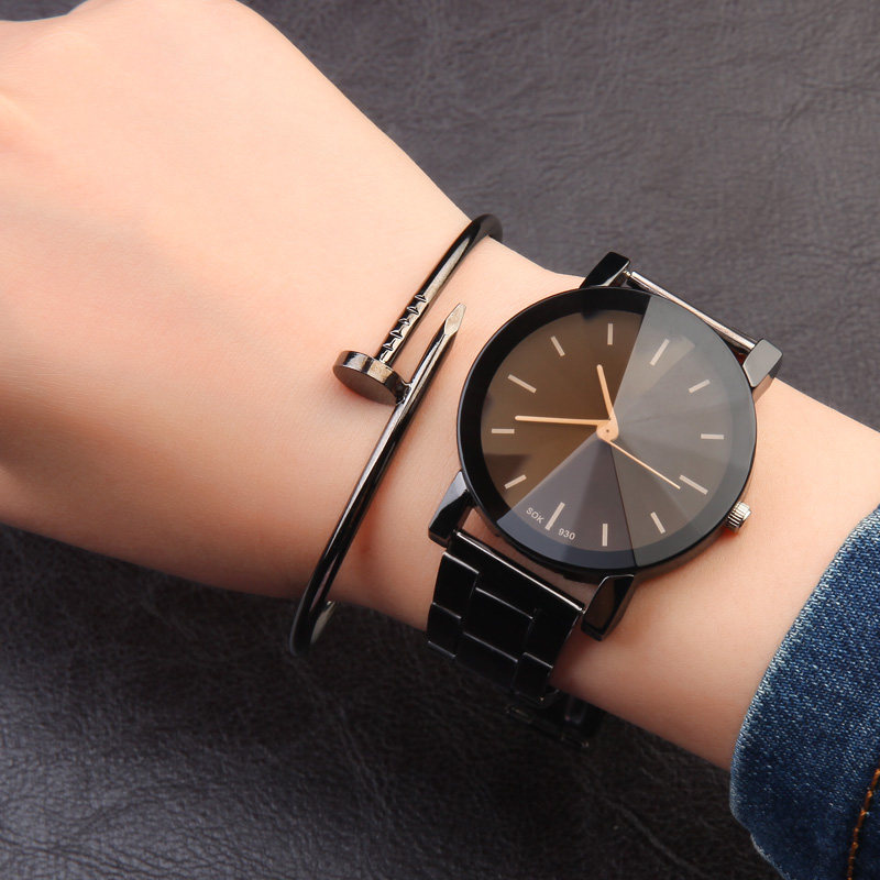 Korean version of the fashion trend mens watch non-mechanical steel band waterproof quartz female middle school student couple watch pair