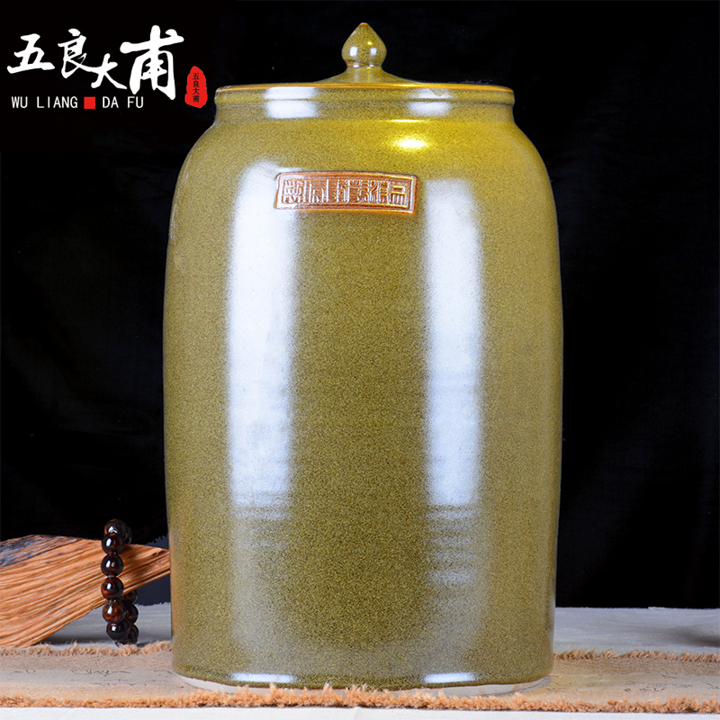 Ceramic jars it oil cylinder storage tank 30 jins 50 kg 100 jins of the big bucket of tea at the end of the cylinder with the tap