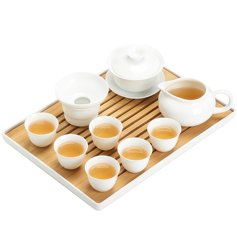 The Sioux ceramic white porcelain kung fu tea set combination of high - grade a rectangle bamboo tea tray was home office to receive a visitor