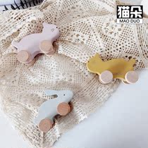 Childrens wooden toys for infants and young children 2-3-6 years old trolley grasping contact Photo childrens room INS Wind decoration male