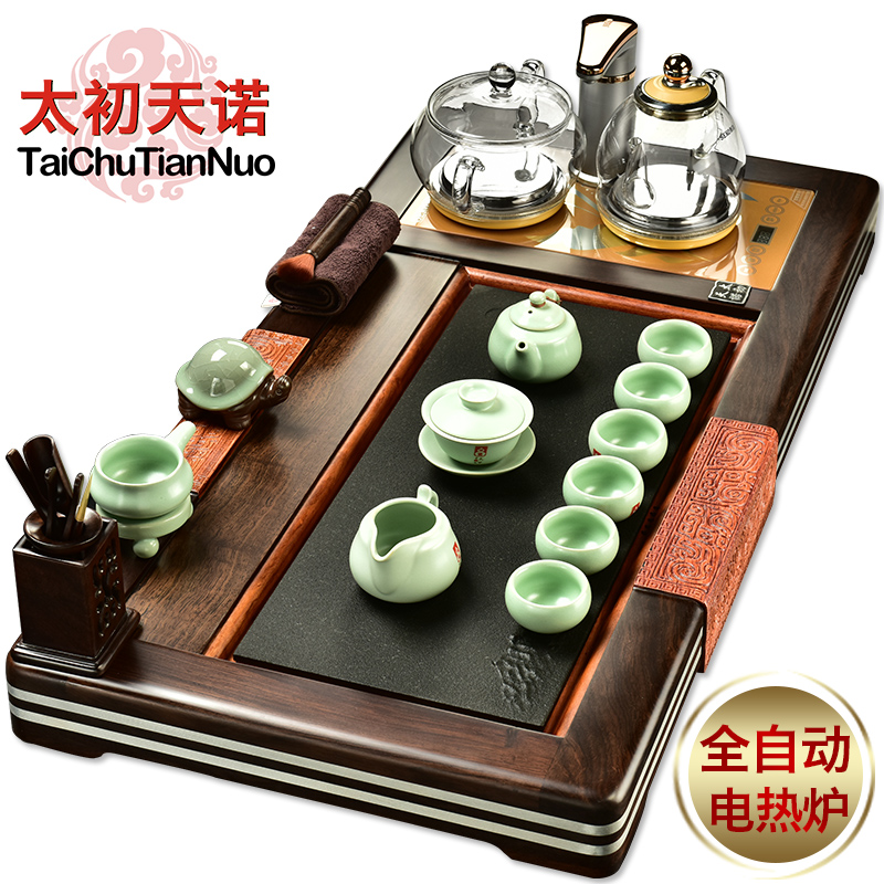 The beginning day, violet arenaceous kung fu tea set four unity of a complete set of automatic sodium silicate on The pot of ebony tea tray