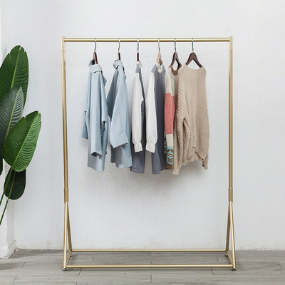 ຮ້ານຂາຍເສື້ອຜ້າສະແດງ rack gold clothes rack women's clothes store shelf floor-standing clothes rack clothes rack iron simple