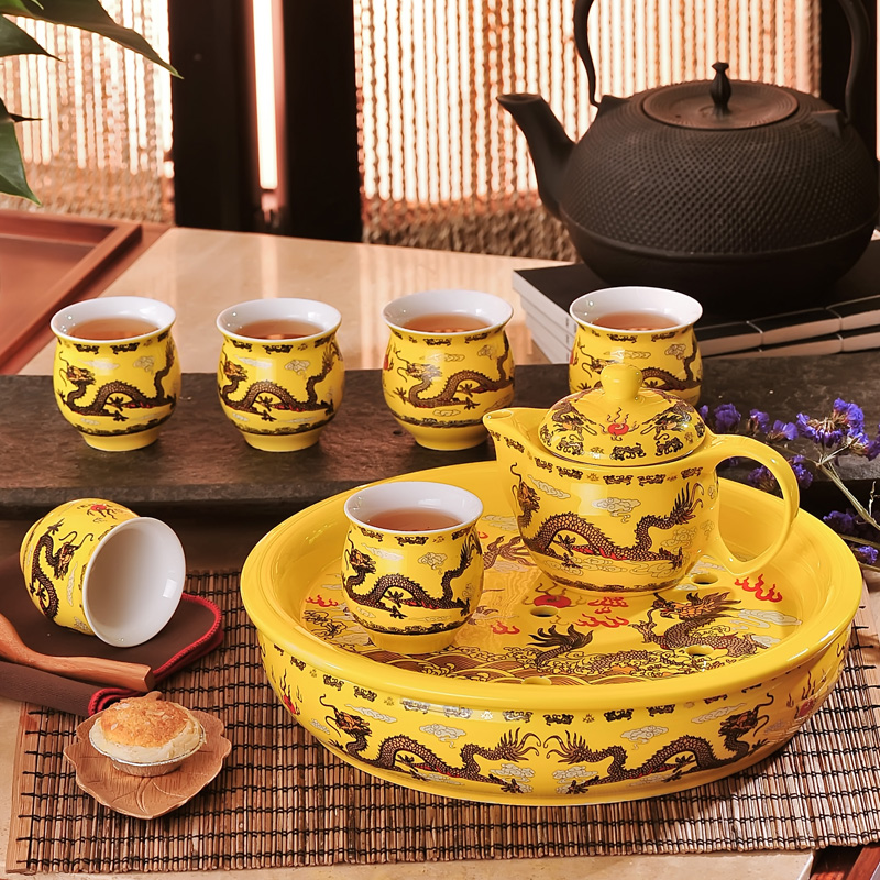 Jingdezhen ceramic tea set suit household of Chinese style kung fu tea taking round a cup of tea with tea tray cups of a complete set of the teapot