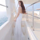 ຊຸດຫາດຊາຍ 2024 ແບບໃໝ່ Super Fairy Sexy Slim Suspender Backless Floor-length Dress Seaside Vacation Travel Photography Dress