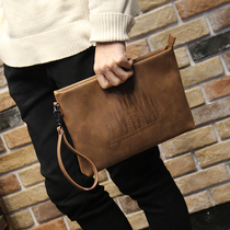 Hong Kong Duty-free New Mens Hands Bag Handbags Letter Enveloping Soft Leather Casual Clip Bag Han Version Crazy Mapleather Bag