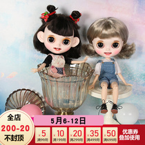 DBS Blythe small cloth doll changed to a finished product with a smile on the face which is a dark brown silver hair