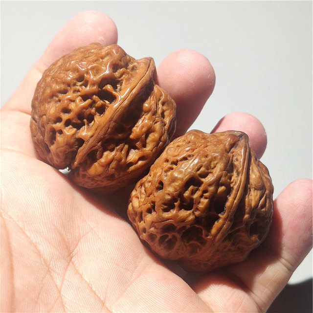 ເຄື່ອງຂັດເນື້ອໄມ້ຫໍ່ walnut ຢ່າງເປັນທາງການ hat walnut ທາດເຫຼັກ walnut pulp-wrapped jade ວັດທະນະທໍາ toy ຕົ້ນສະບັບສີ walnut handle ສິ້ນ