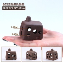 Arranged accessories small fish shelter from the house spawning cave tile background Interiors small cleaning Small size scenery porous build view