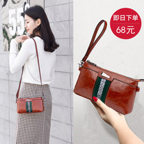 2020 new hand-held small square bag Korean version of fashion contrast color oblique cross-grasp multi-functional bag soft leather wear-resistant handbag