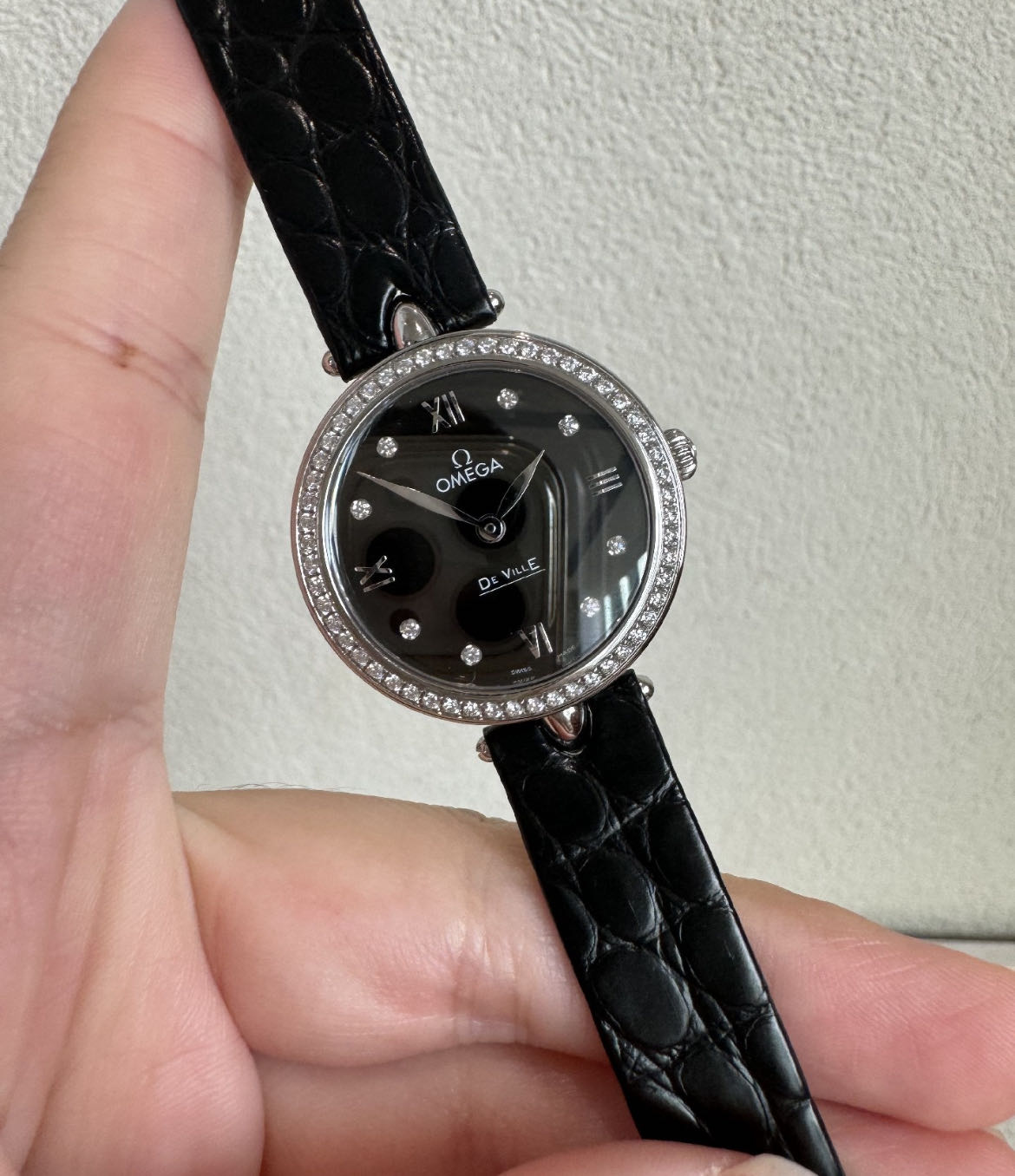 2折95新欧米茄瑞士蝶飞424.18.27.60.51.001精钢后镶钻石英女表