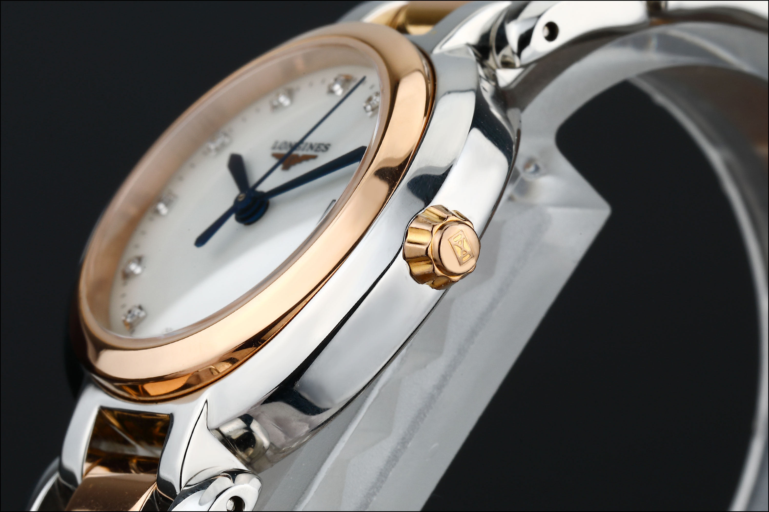 3折9.8新浪琴心月18k玫瑰金原镶时标钻石英女表l8.110.5.87.