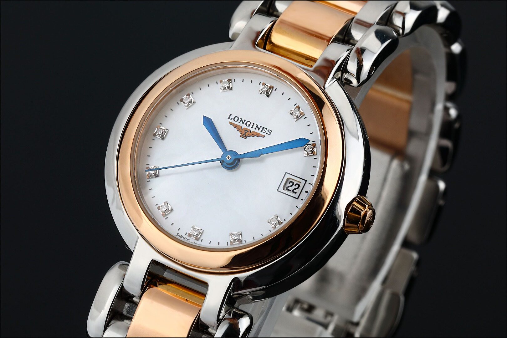 3折9.8新浪琴心月18k玫瑰金原镶时标钻石英女表l8.110.5.87.