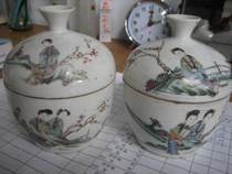 A pair of old porcelain sugar cylinder with a pair of household parts