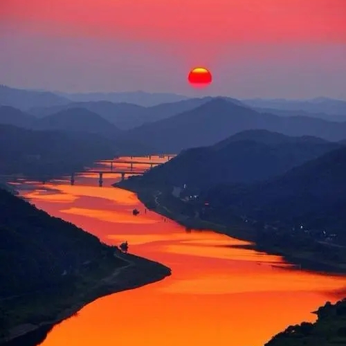 日出江花红胜火