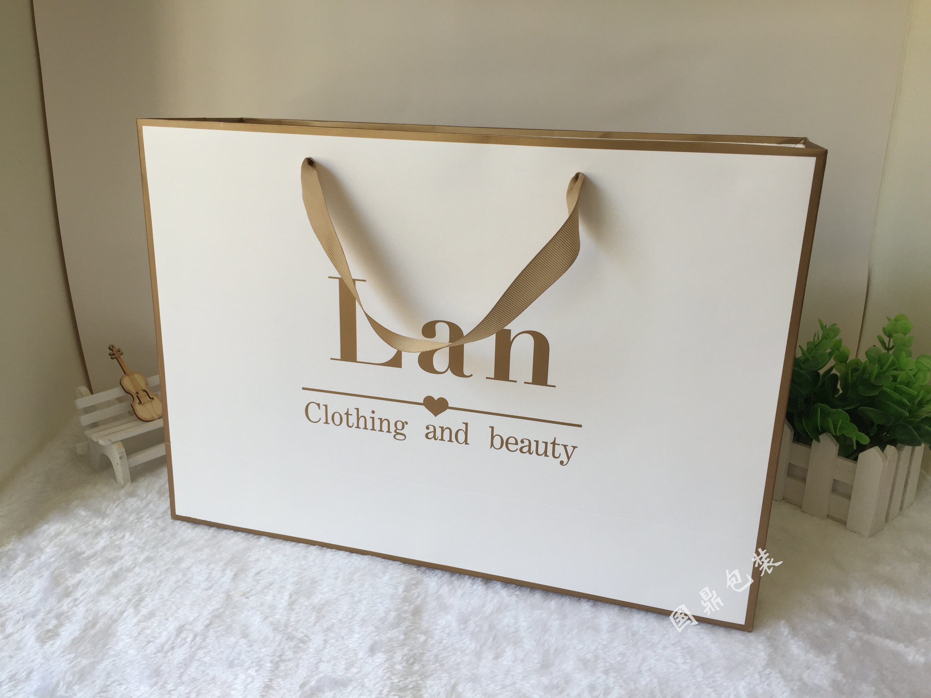 纸袋定做服装店手提袋订做牛皮纸袋定制高档购物定做印刷logo优惠券