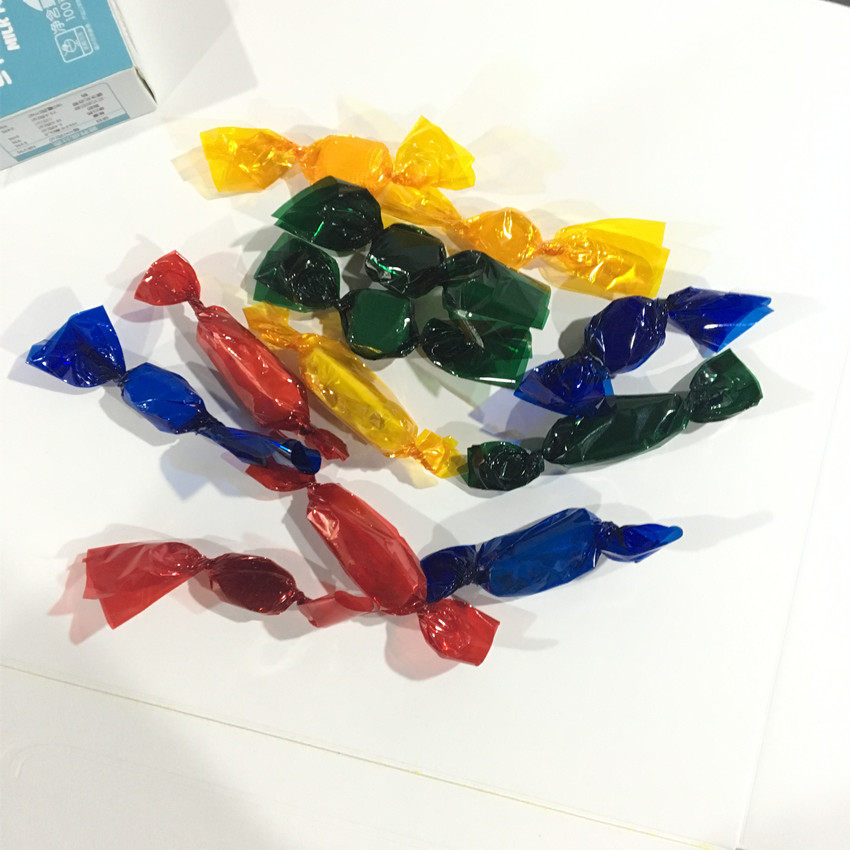 特价台湾牛轧糖纸_台湾进口透明玻璃糖纸 彩色糖果纸牛轧糖包装纸