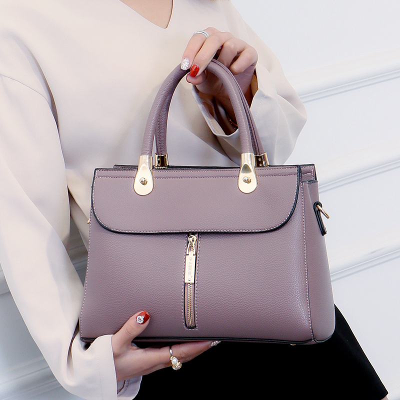 女手提包 大气 真皮_女式包包2019新款时尚大气真皮手提包女妈妈款