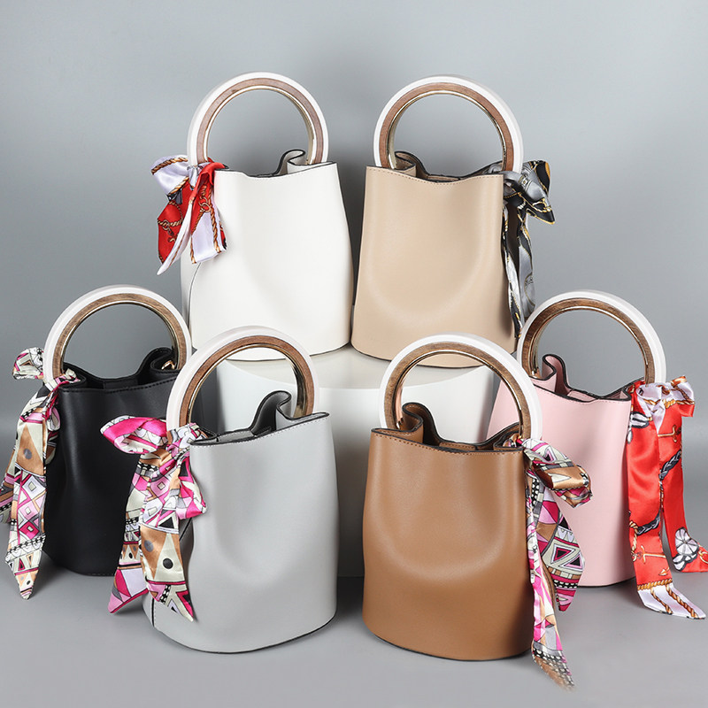 圆环水桶包_savis网红同款水桶包包女2019新款手拎包 时尚圆环手提包