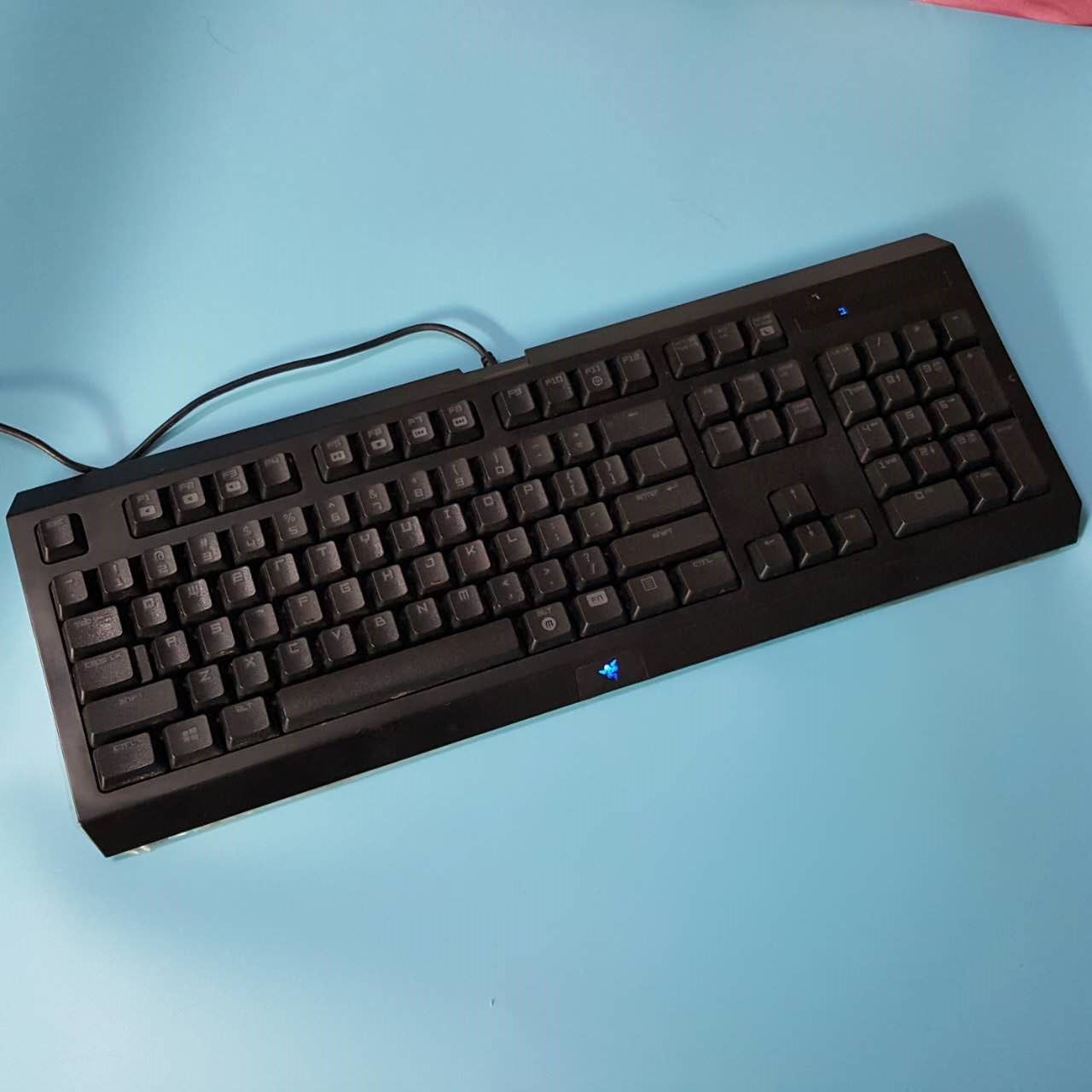 雷蛇粉色键盘_正品二手 雷蛇二角尘蛛薄膜有线游戏键盘 高键帽设计