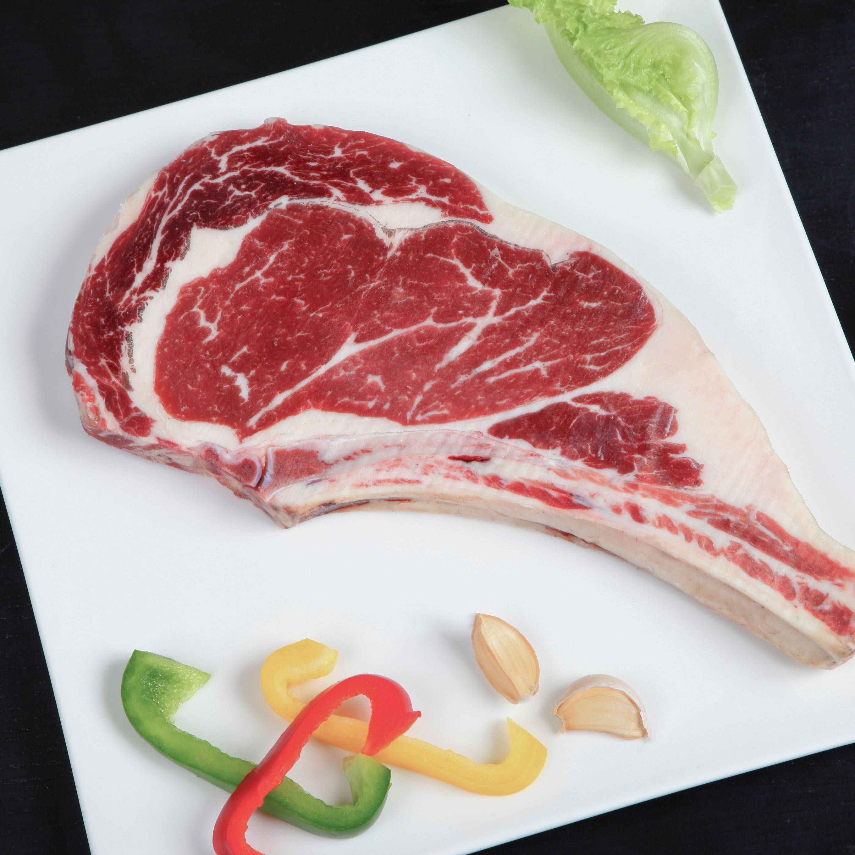 战斧牛排_澳大利亚进口a5级厚切战斧牛排新鲜带骨眼肉非腌制1000g优惠