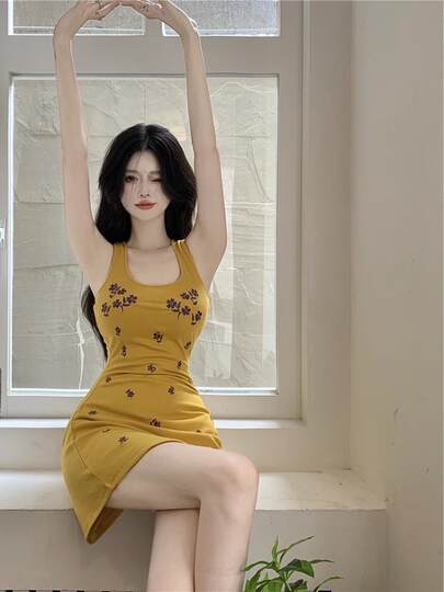 Yellow embroidered floral camisole dress women's summer design slim fit pure desire hot girl hip-covering short skirt