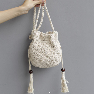 复古小清新 棉麻针织水桶包女包 百搭编织感单肩斜挎流苏抽绳小包