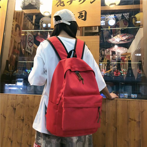 简约百搭双肩包红色大容量大学生时尚书包女韩Q版高中背包男旅行