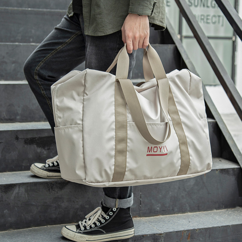 时尚手提旅行包男大容量收纳折叠包短途轻便行李包简约行李袋女包,箱包皮具/热销女包/男包,旅行袋,淘宝优惠券,粉丝福利购,淘宝优惠卷