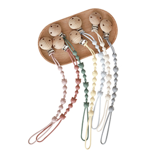 新款ins婴儿奶嘴防掉链 卡通食品级硅胶奶嘴链 儿童磨牙木夹挂绳