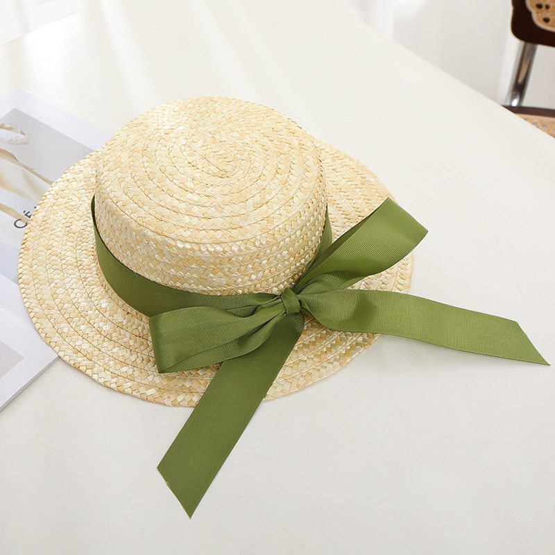 麦秆编织平顶果绿色蝴蝶结飘带度假龄檐遮阳宽草帽女版韩夏沙滩减