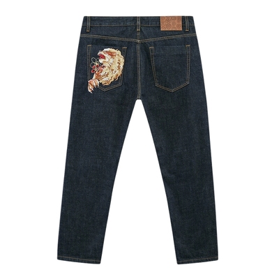 泥棒蓝五福火狮绣花红布边牛仔裤