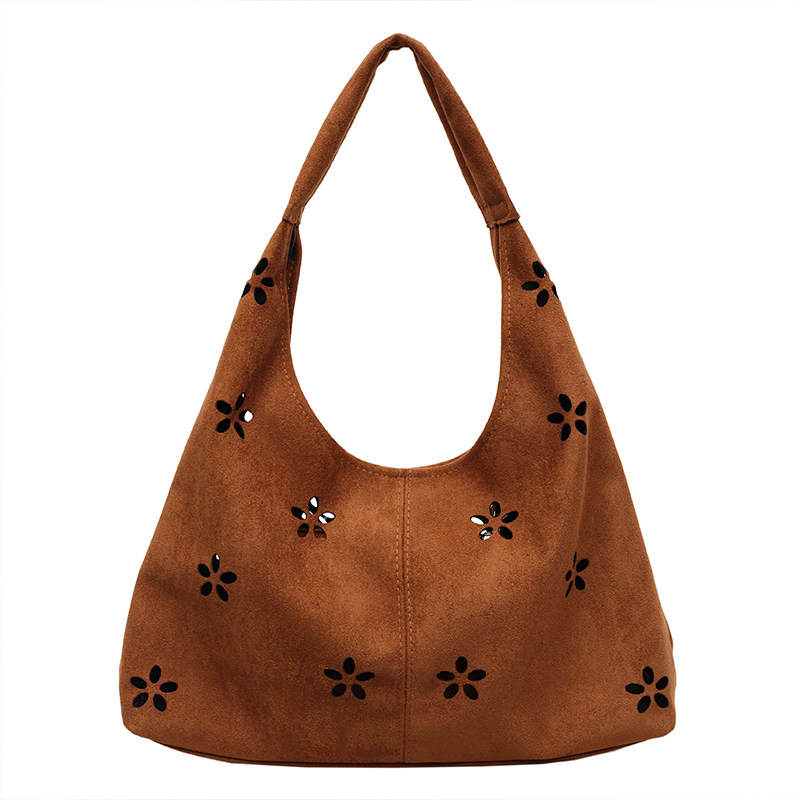 小众设计腋下包包女式2026新款秋冬复古镂空单肩包百搭通勤托特包